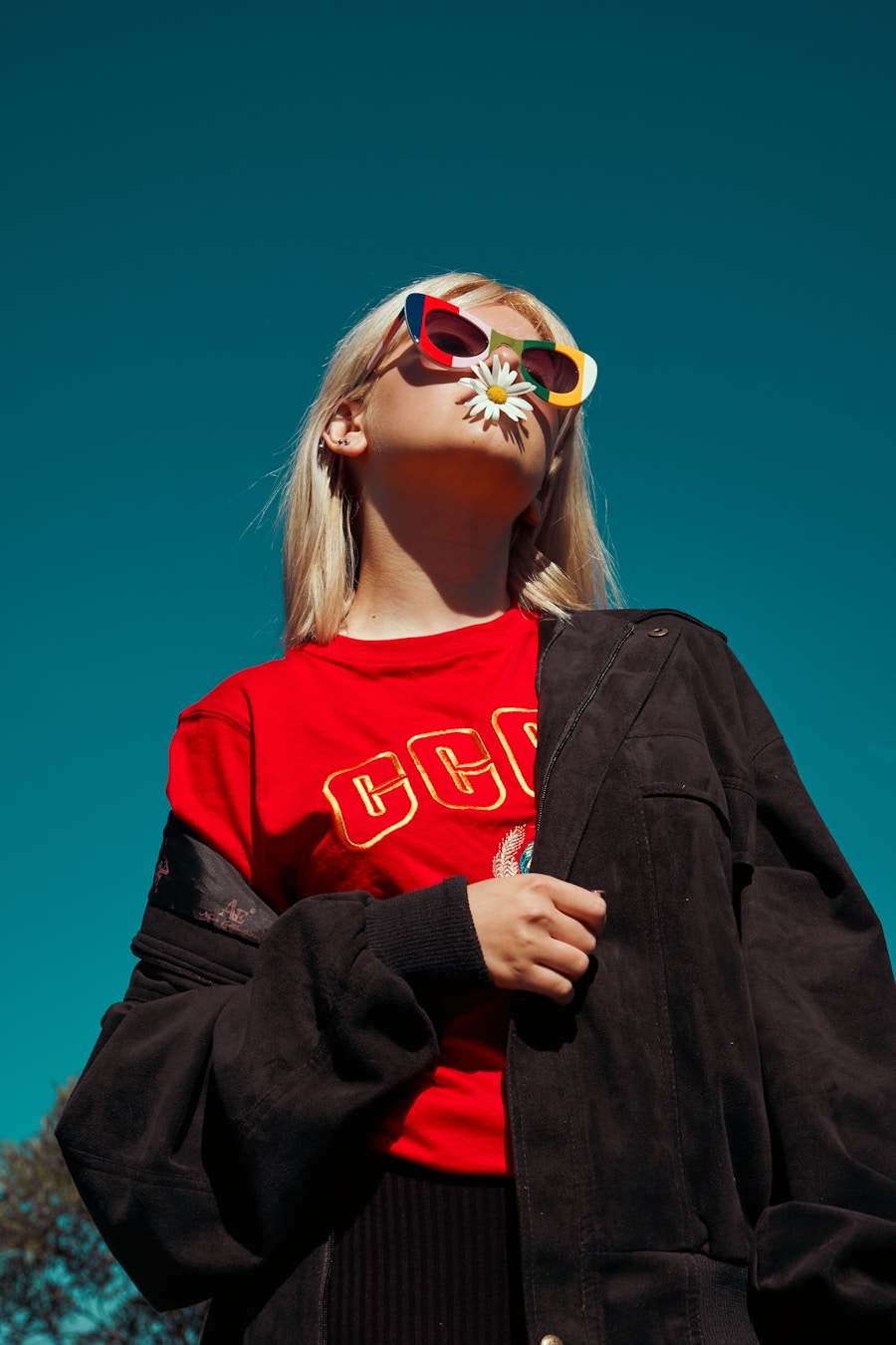 Fashion creator wearing sunglasses from Unsplash